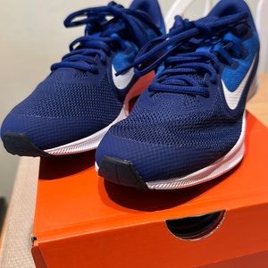 One pair of Nike nice blue sneakers, size 7Y,